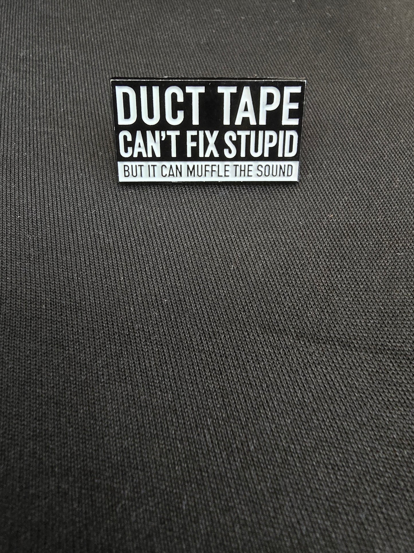"Duct Tape Can't Fix Stupid, But It Sure Can Muffle the Sound" Enamel Pin