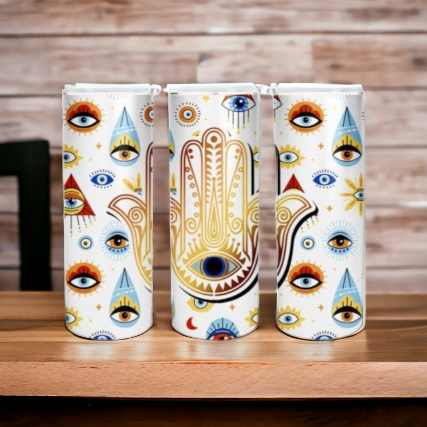 White and blue 20oz stainless steel evil eye tumbler