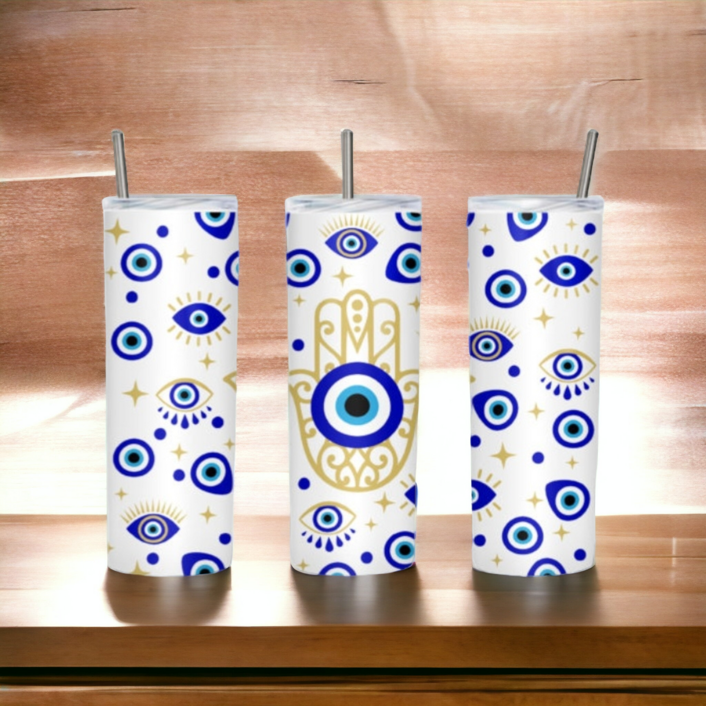 White and blue 20oz stainless steel evil eye tumbler